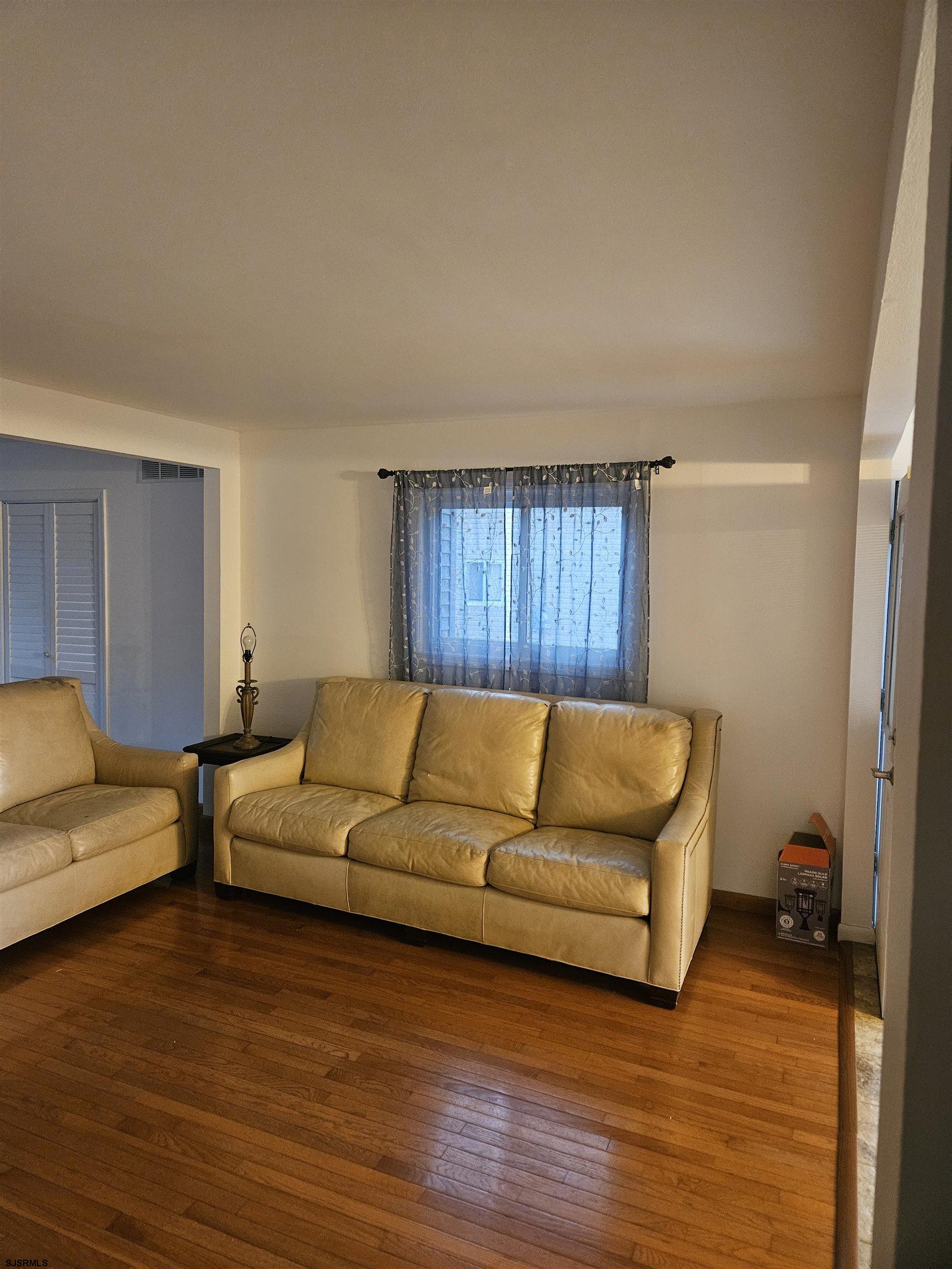 33 Mac Knight Drive Clementon, NJ 08021 - Photo 20 of 51 a living room with furniture and a wooden floor