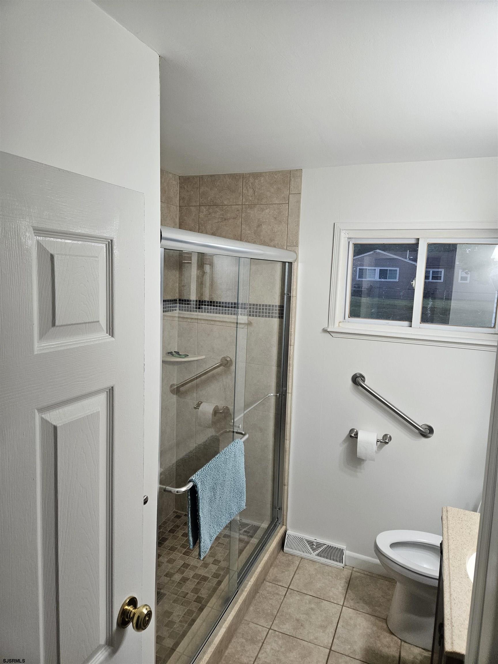 33 Mac Knight Drive Clementon, NJ 08021 - Photo 30 of 51 a bathroom with a toilet and a shower