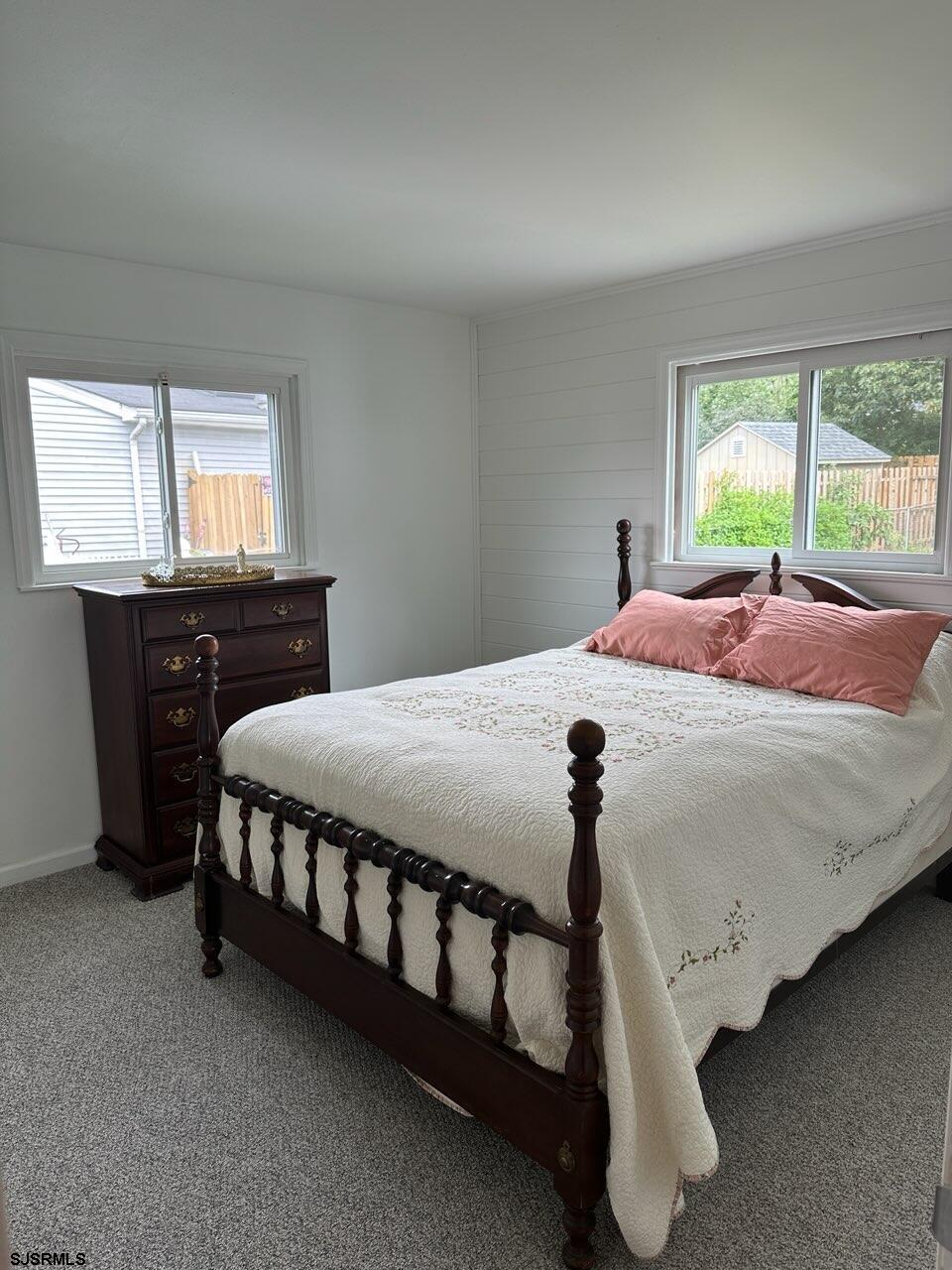 33 Mac Knight Drive Clementon, NJ 08021 - Photo 36 of 51 a bed sitting in a bedroom next to a window