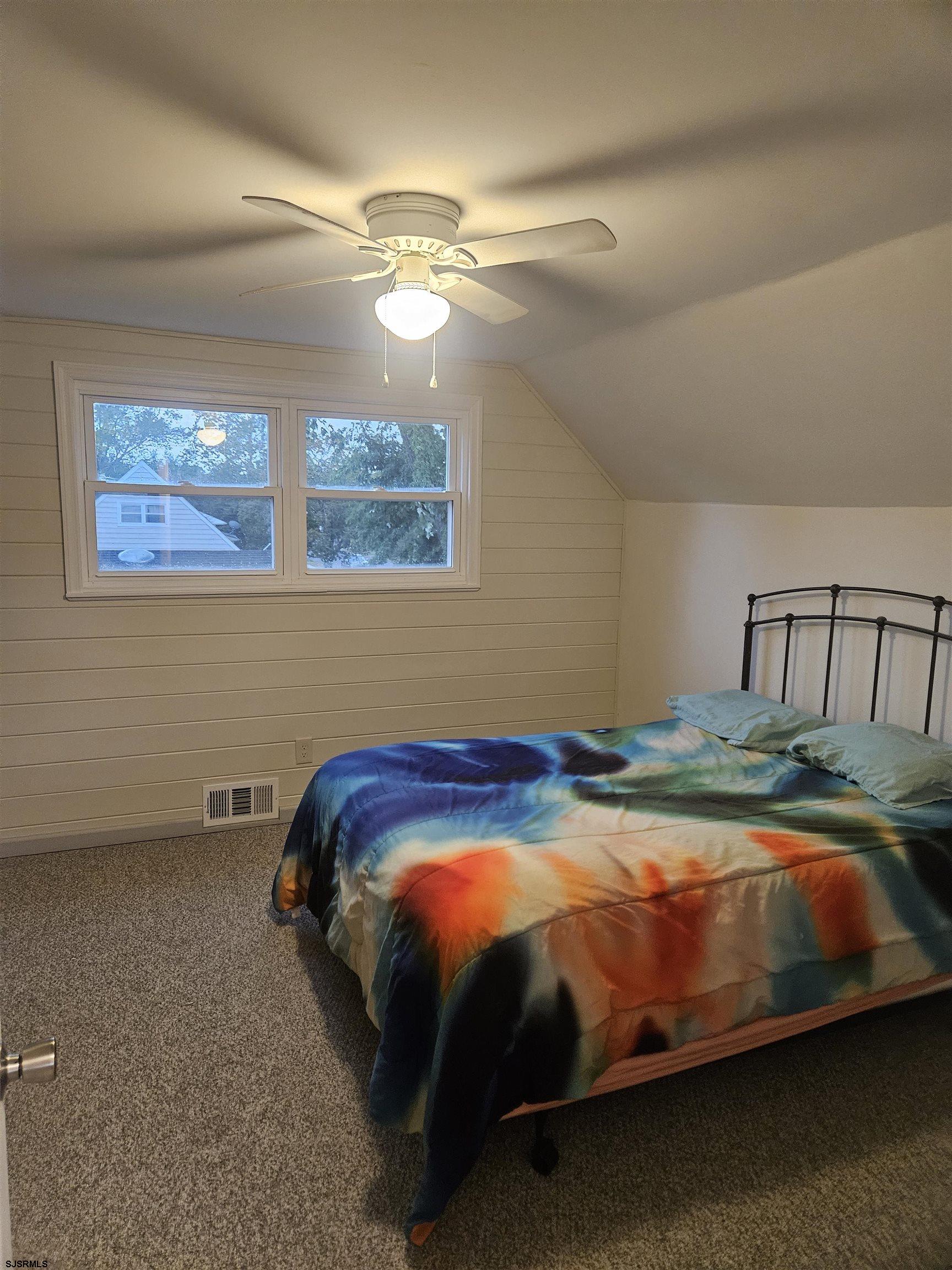 33 Mac Knight Drive Clementon, NJ 08021 - Photo 45 of 51 a bed sitting in a bedroom next to a window