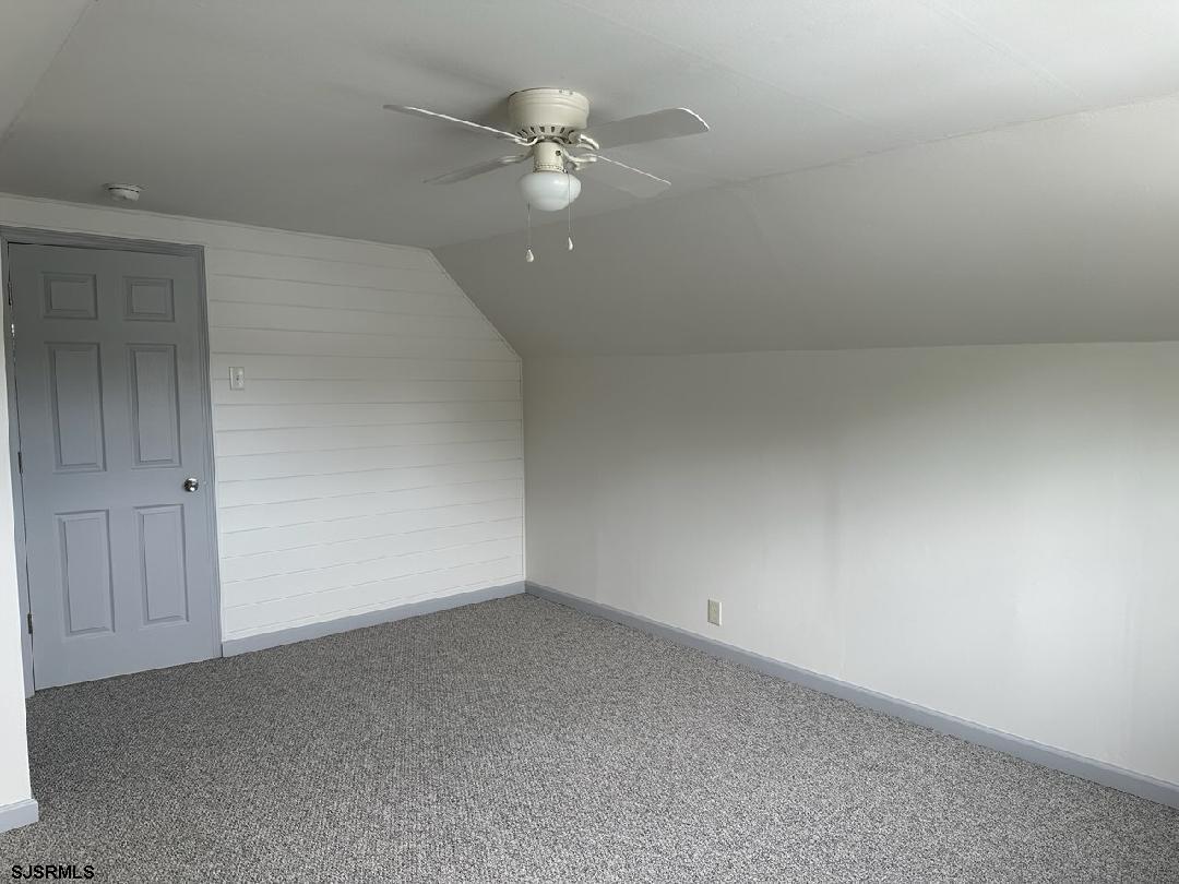 33 Mac Knight Drive Clementon, NJ 08021 - Photo 50 of 51 an empty room with a fan & a ceiling fan