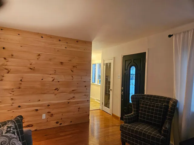 a bathroom with a shower and a mirror