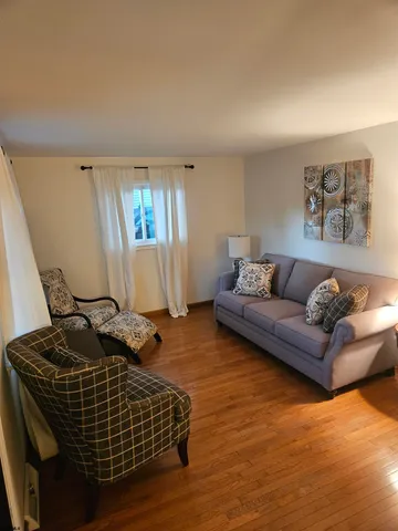 a living room with furniture and a couch