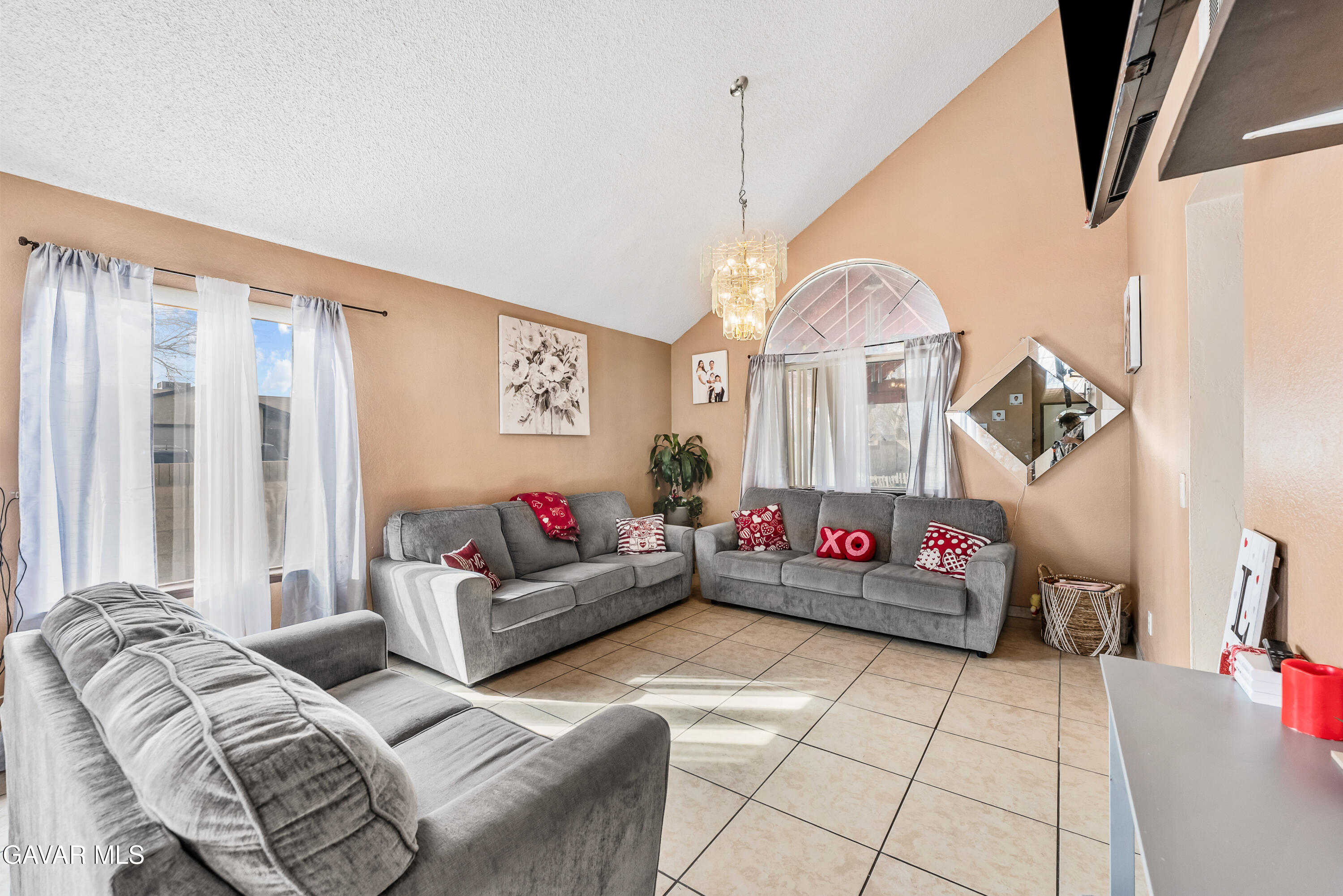 43903 11th Street East Lancaster, CA 93535 - Photo 8 of 45 a living room with furniture and a floor to ceiling window