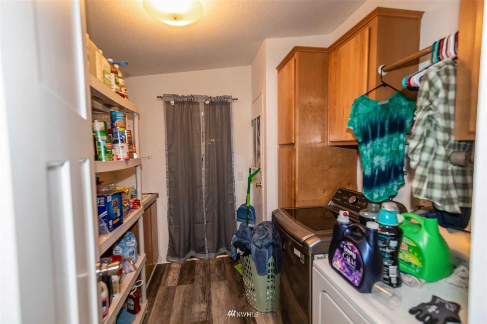 11205 180th Lane Southwest Rochester, WA 98579 - Photo 20 of 33 a view of walk in closet with clothes and shoes
