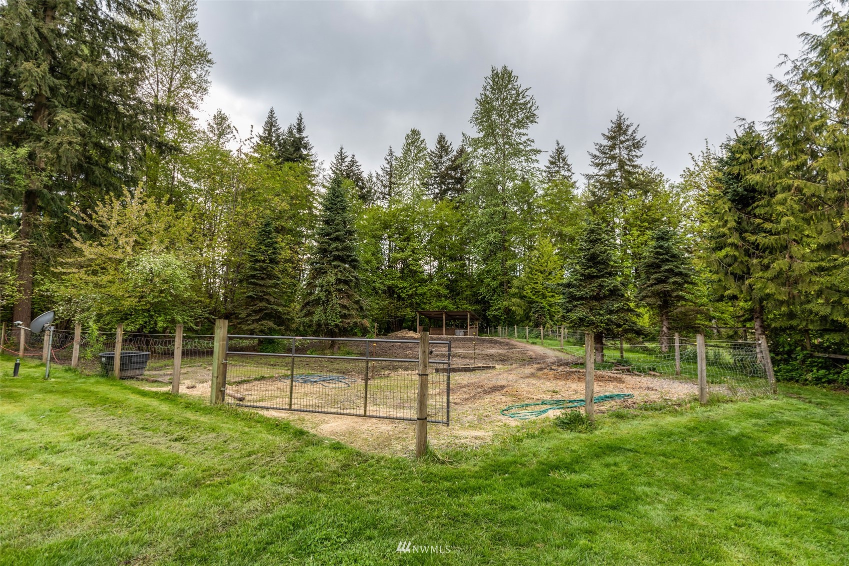 11205 180th Lane Southwest Rochester, WA 98579 - Photo 2 of 33 a view of a park with a tree
