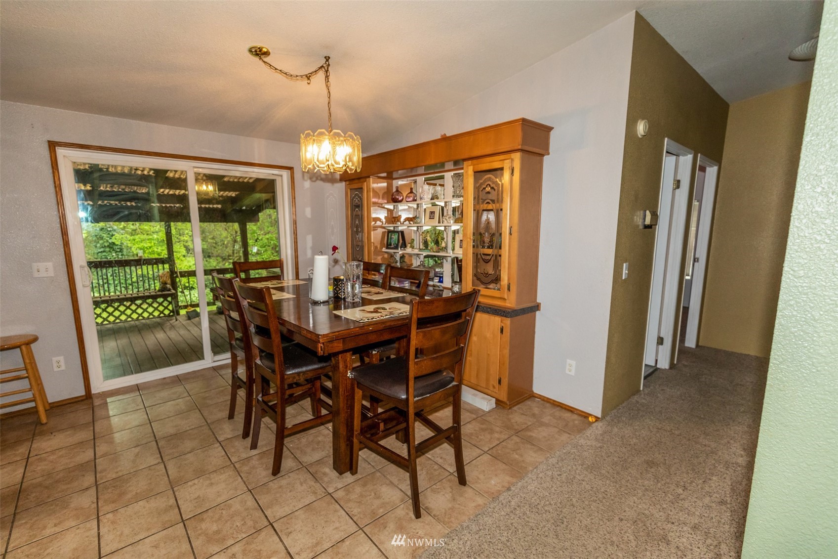 11205 180th Lane Southwest Rochester, WA 98579 - Photo 24 of 33 a view of a dining room with furniture window and outside view