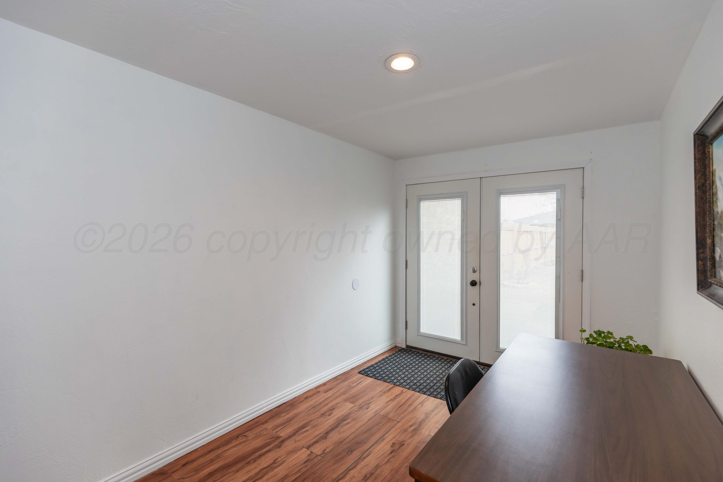 7308 Holyoke Trail Amarillo, TX 79121 - Photo 29 of 39 a view of hallway with wooden floor