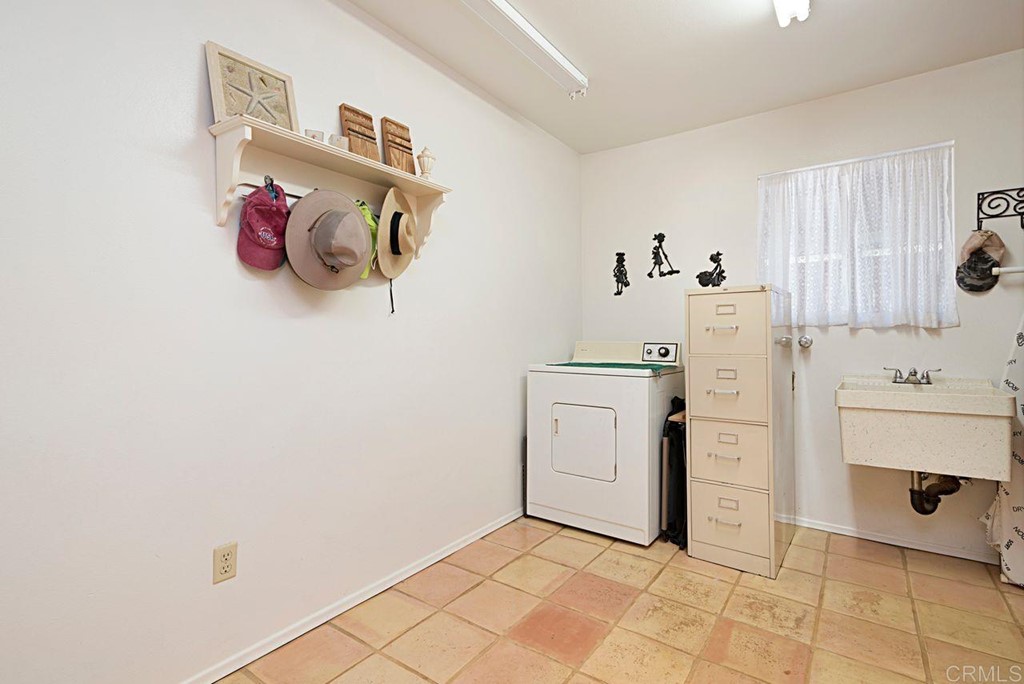 29573 Miller Road Valley Center, CA 92082 - Photo 25 of 37 a storage room with washer and dryer