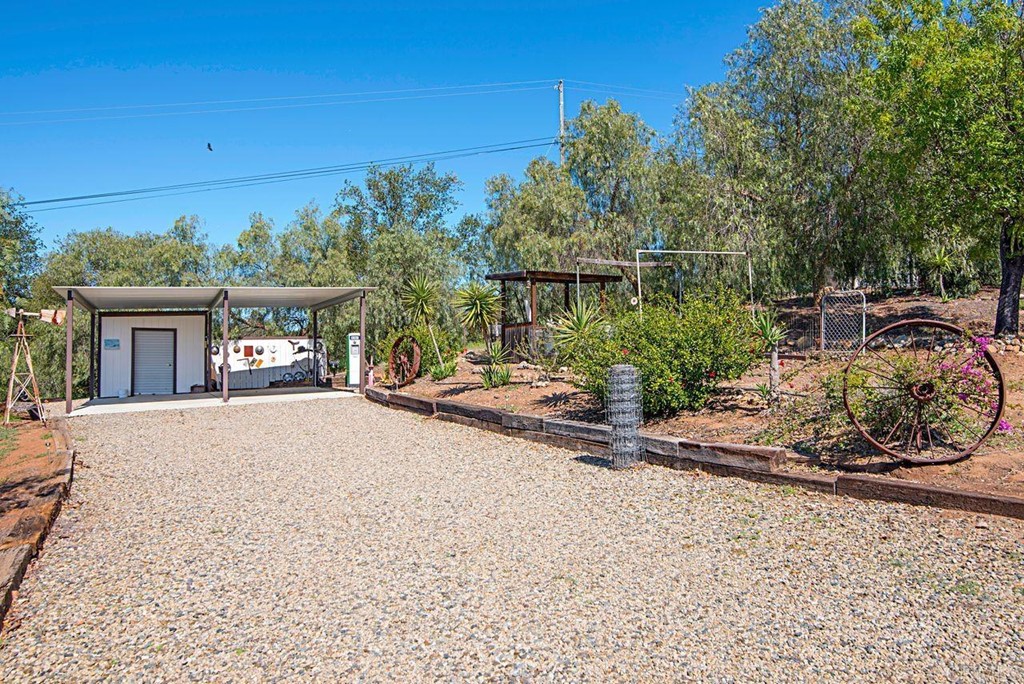 29573 Miller Road Valley Center, CA 92082 - Photo 36 of 37 a view of a house with a patio