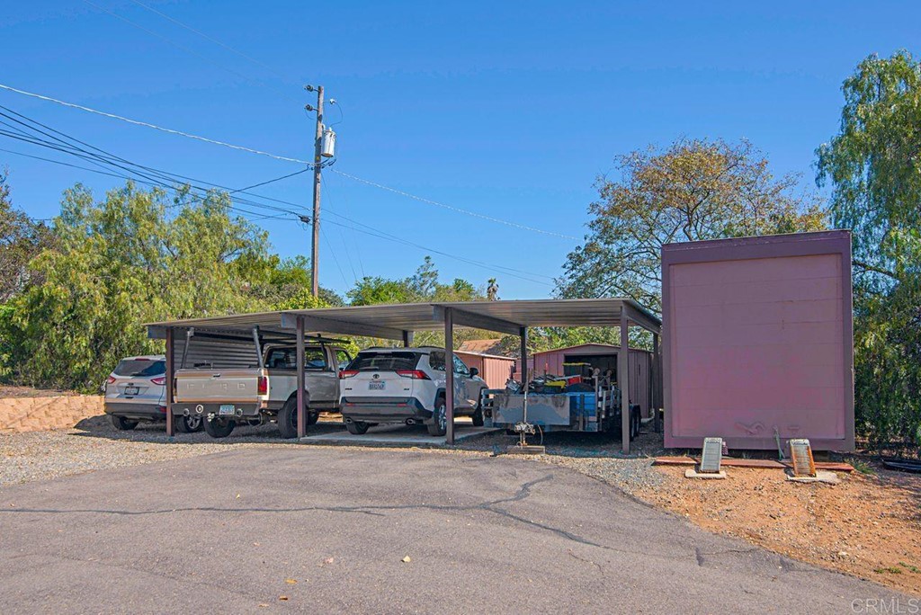 29573 Miller Road Valley Center, CA 92082 - Photo 37 of 37 a car parked in front of a building