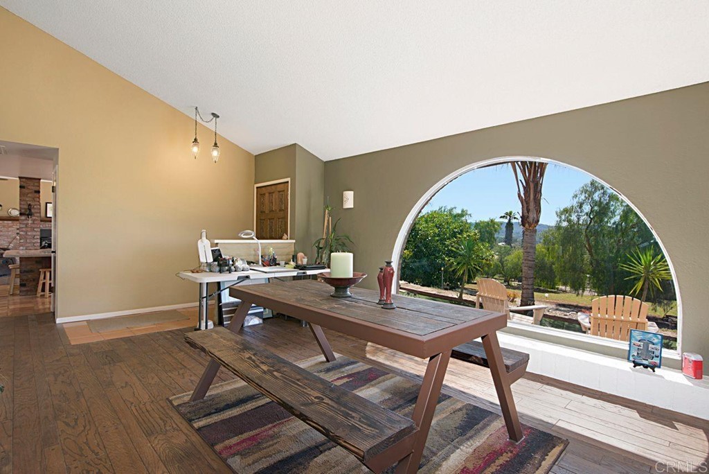 29573 Miller Road Valley Center, CA 92082 - Photo 9 of 37 a workspace with furniture and a large window