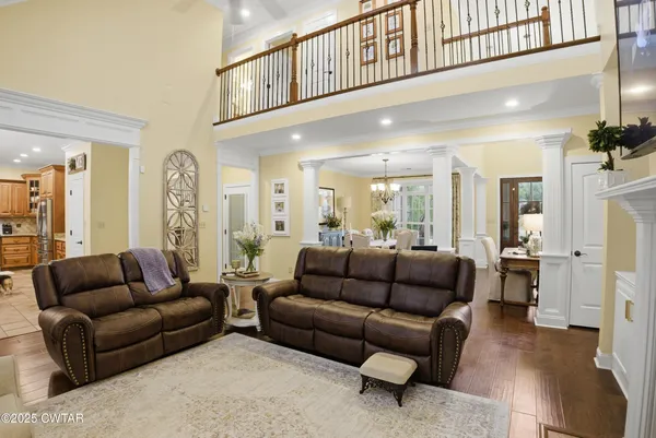 a bathroom with a granite countertop sink a mirror and a shower
