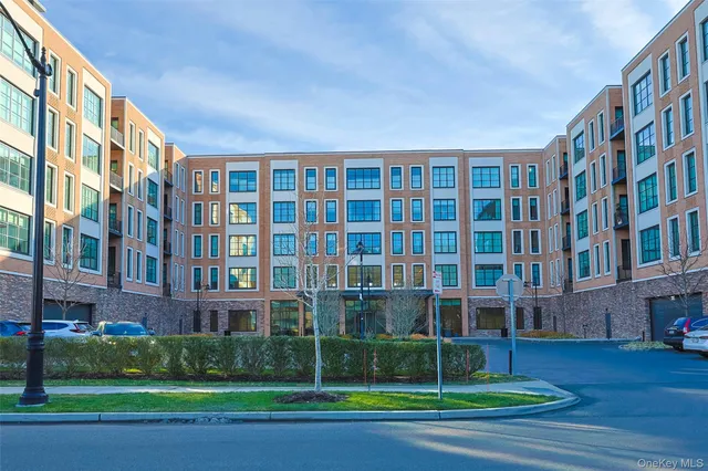 a view of a building with a yard