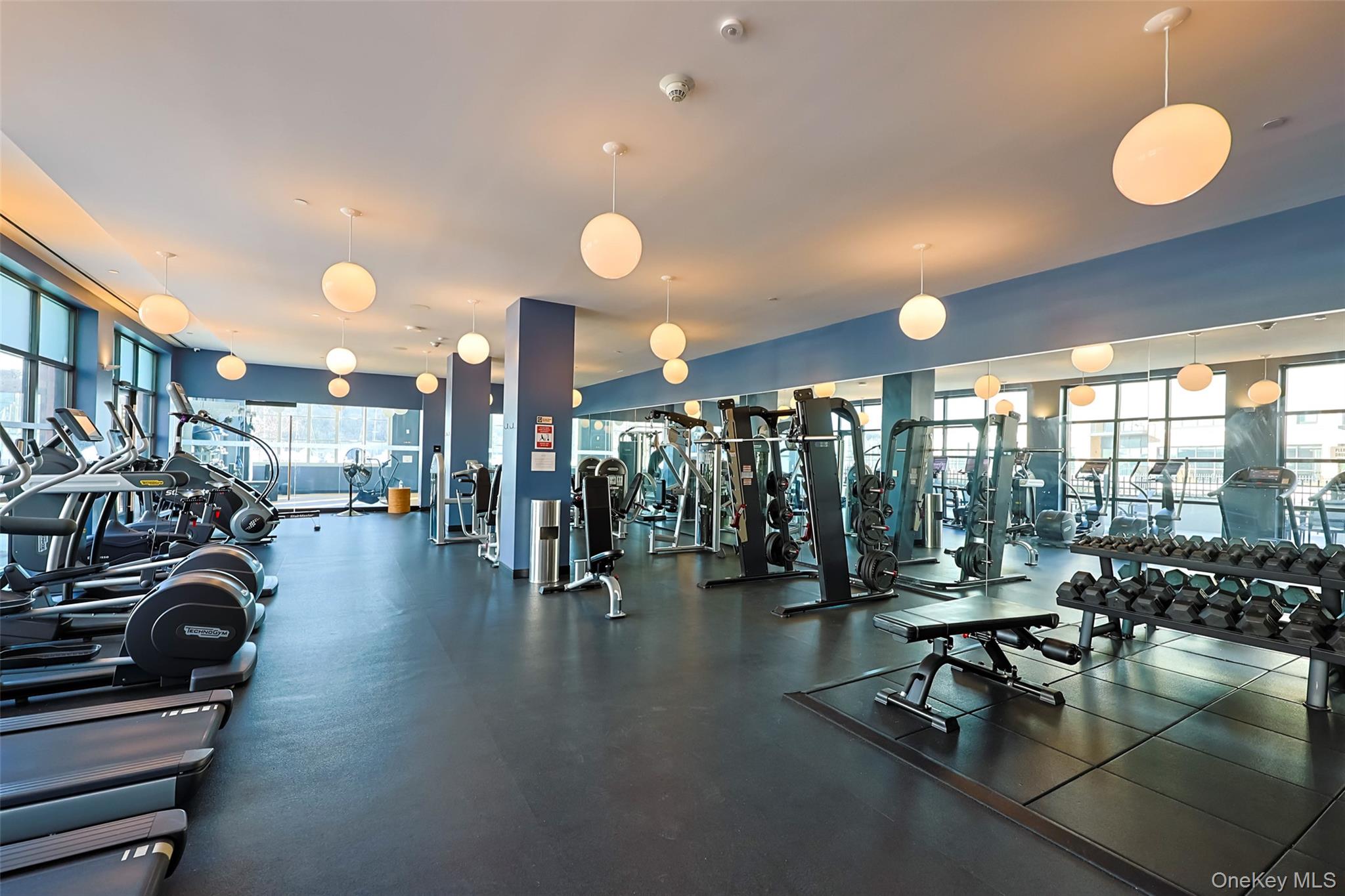 100 Garvies Point Road, Unit 1024 Glen Cove, NY 11542 - Photo 35 of 41 a view of a room with gym equipment