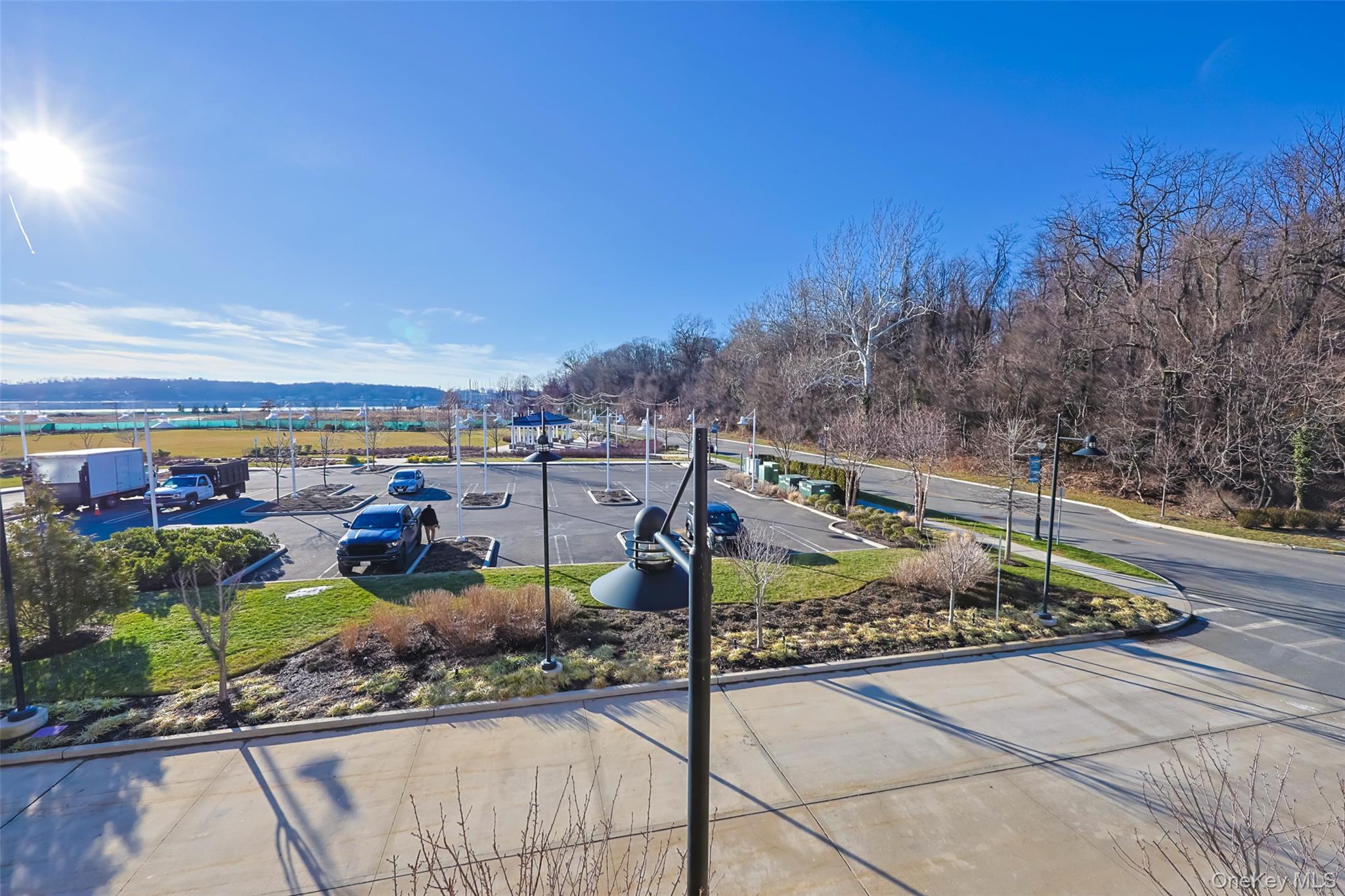 100 Garvies Point Road, Unit 1024 Glen Cove, NY 11542 - Photo 38 of 41 a view of a garden with sitting area