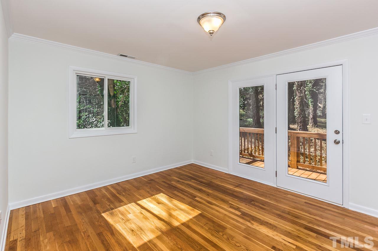 1237 Somerset Road Raleigh, NC 27610 - Photo 5 of 25 a view of an empty room with a window