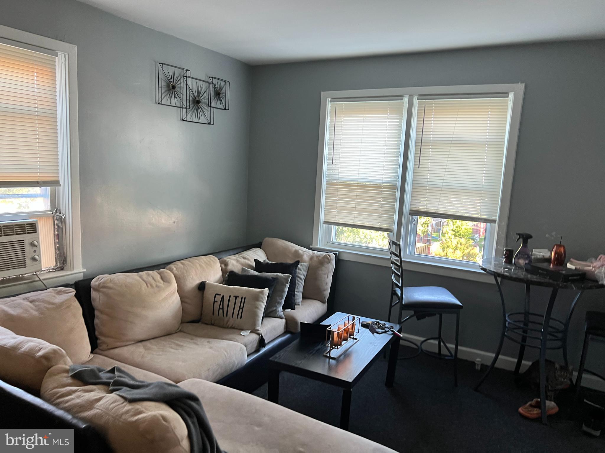 4132 Audrey Avenue Baltimore, MD 21225 - Photo 4 of 14 a living room with furniture and a window