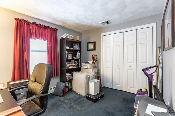 a room with furniture and a window