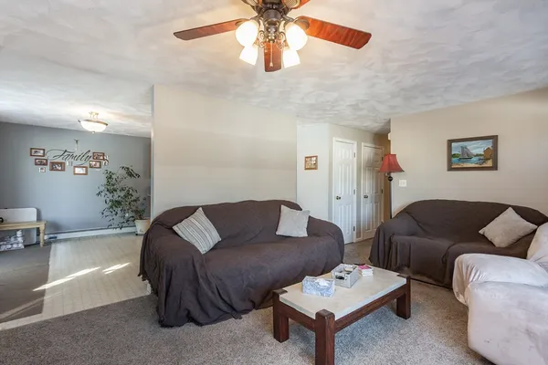 a living room with furniture and a couch