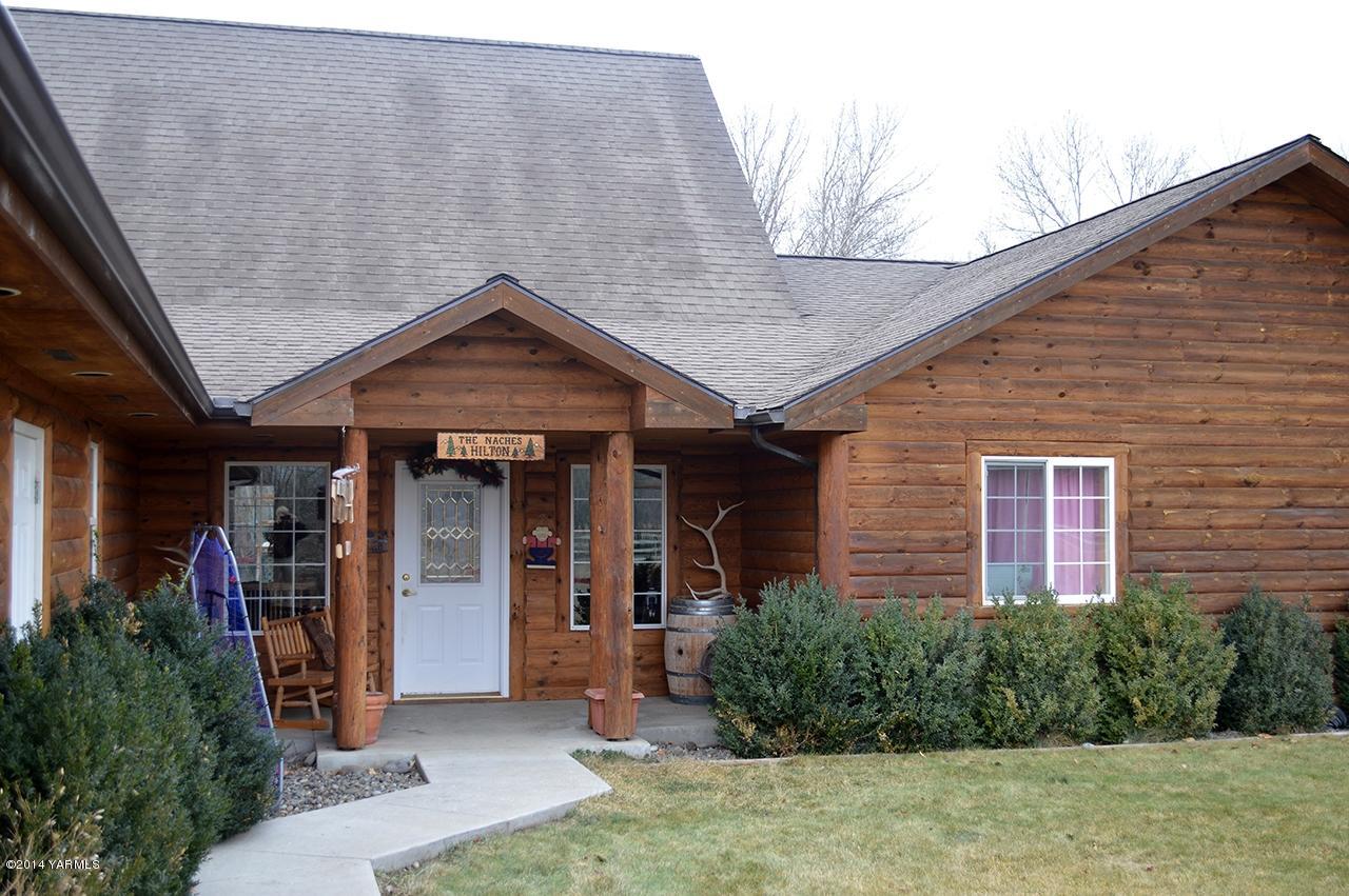 870 Lewis Road Naches, WA 98937 - Photo 2 of 24 a front view of a house with garden