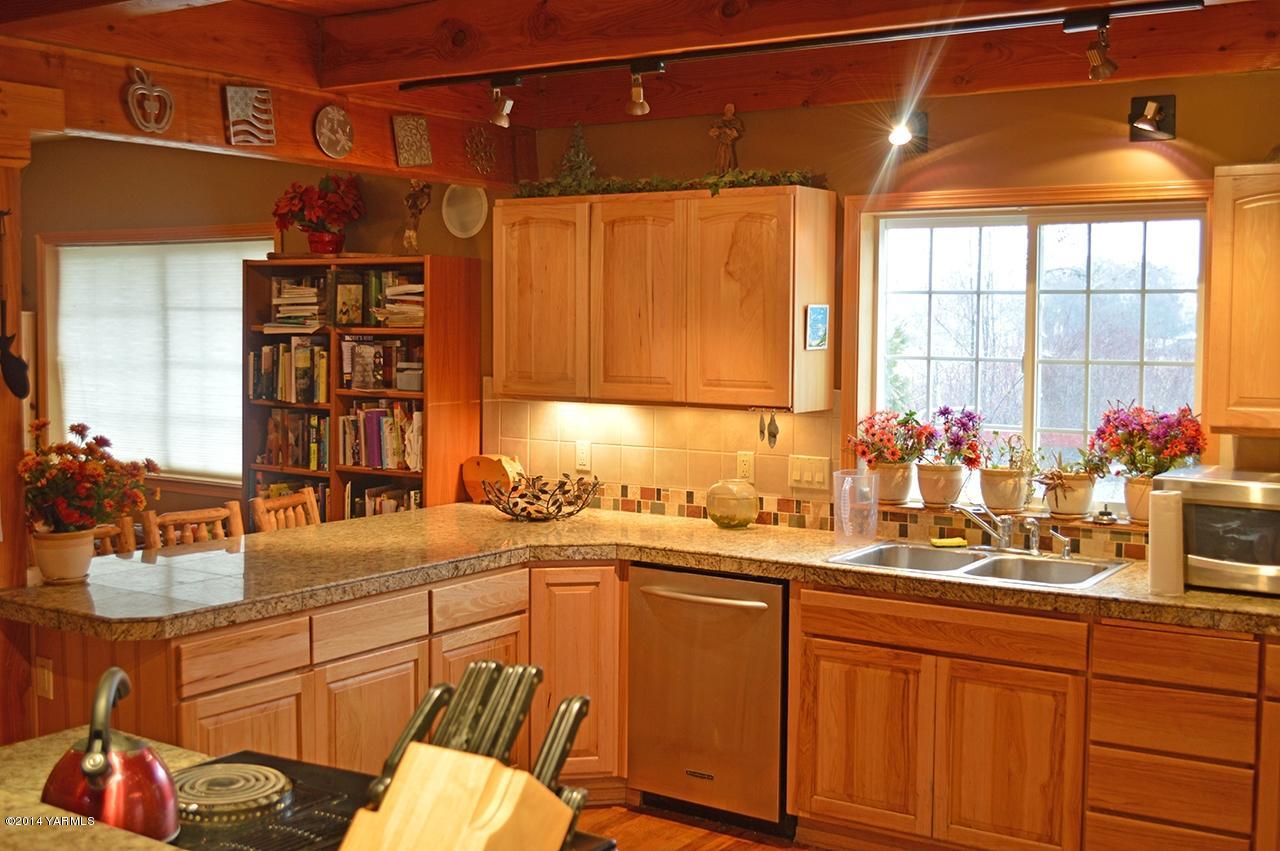 870 Lewis Road Naches, WA 98937 - Photo 8 of 24 a kitchen with a sink and a window