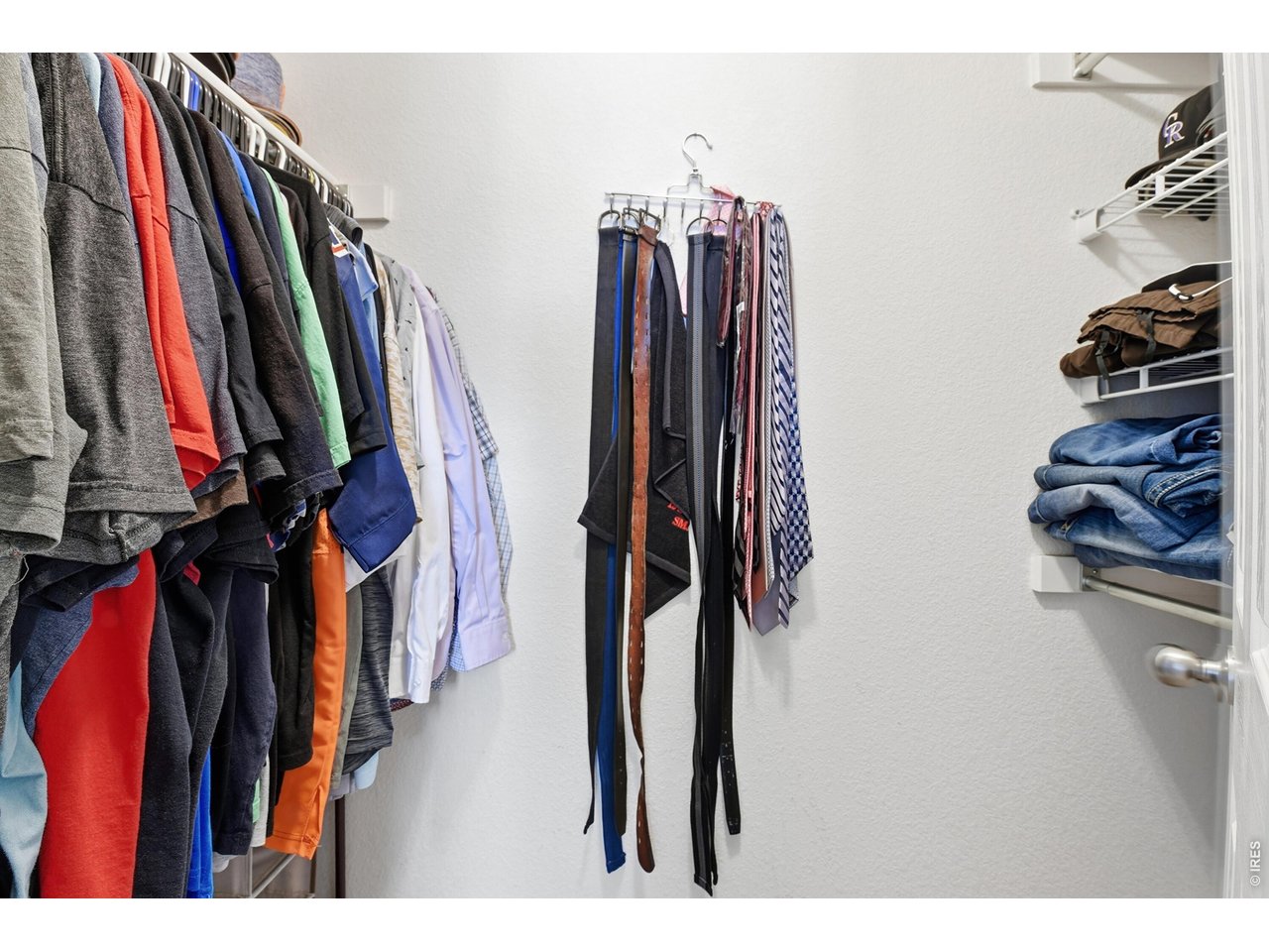 6291 Taylor Street Frederick, CO 80530 - Photo 24 of 50 a view of walk in closet with clothes and shoes