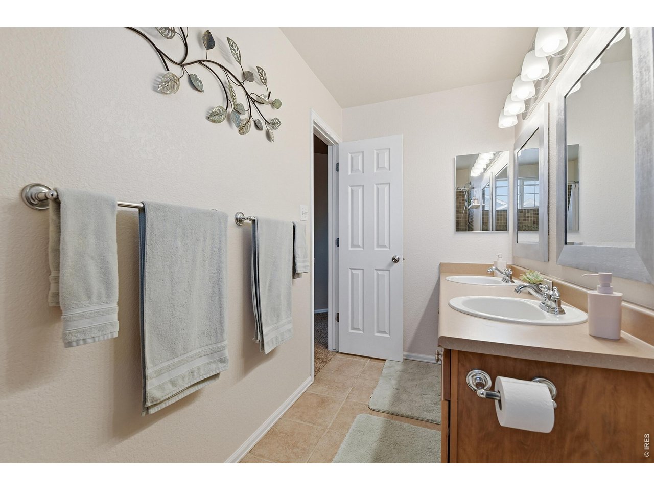 6291 Taylor Street Frederick, CO 80530 - Photo 26 of 50 a bathroom with a sink mirror and vanity