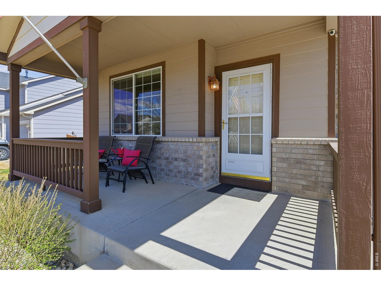 6291 Taylor Street Frederick, CO 80530 - Photo 3 of 50 a balcony with chairs and a table