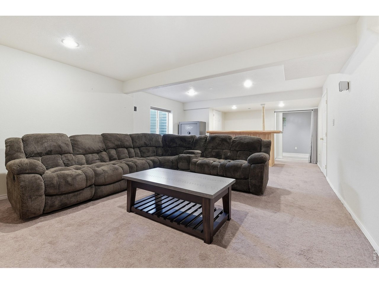 6291 Taylor Street Frederick, CO 80530 - Photo 33 of 50 a living room with furniture and a couch