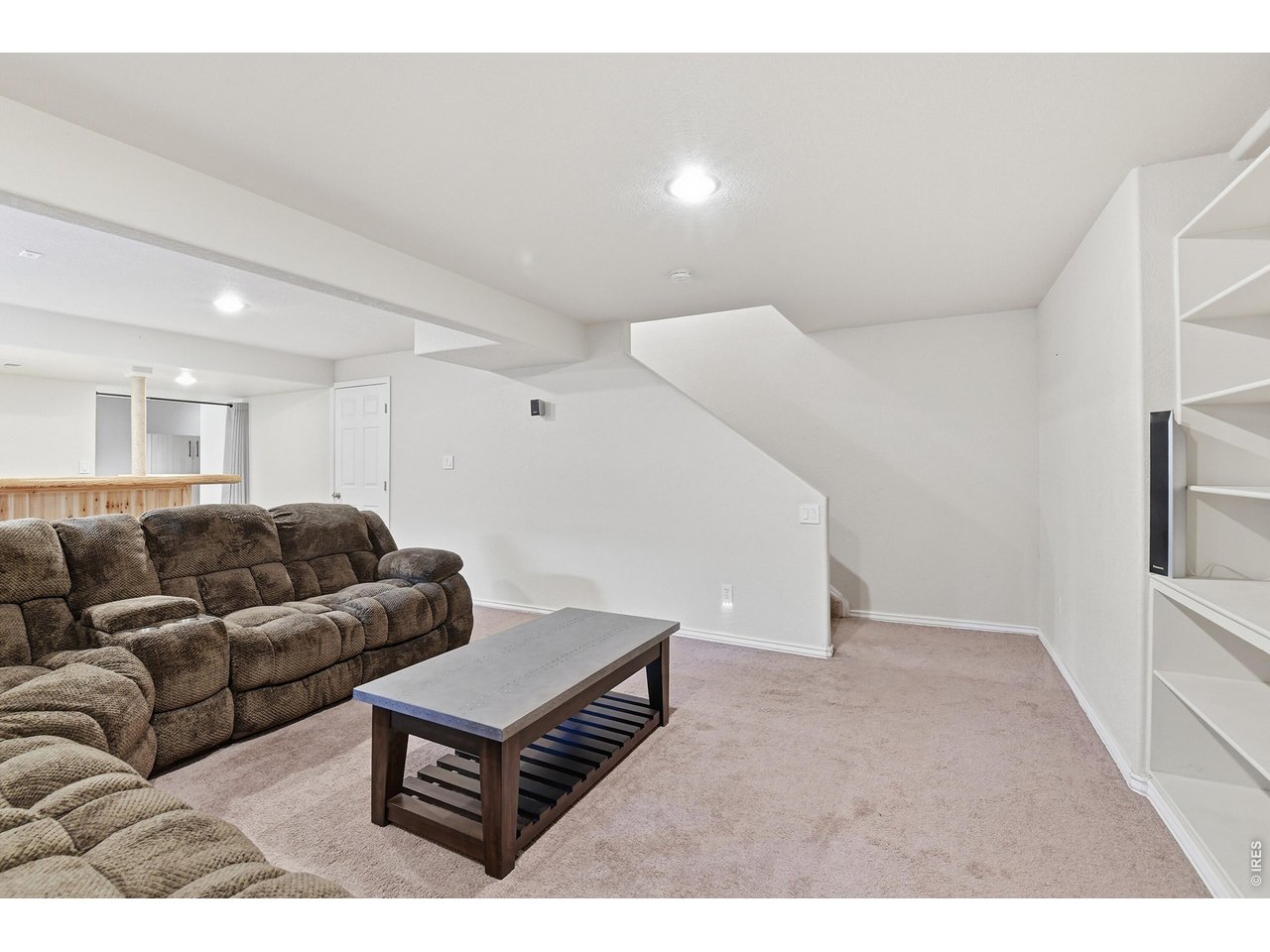 6291 Taylor Street Frederick, CO 80530 - Photo 34 of 50 a living room with furniture and a couch