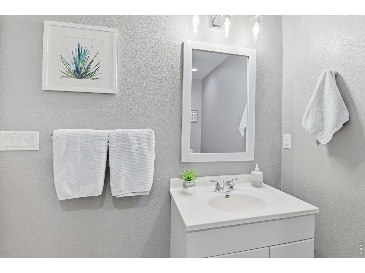 6291 Taylor Street Frederick, CO 80530 - Photo 36 of 50 a white sink sitting next to a white bathroom