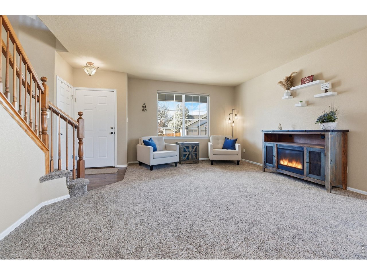 6291 Taylor Street Frederick, CO 80530 - Photo 5 of 50 a living room with furniture and a fireplace