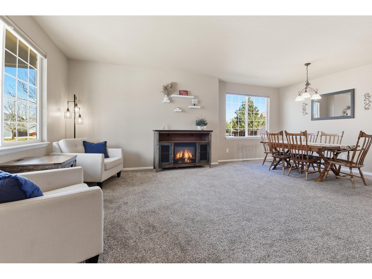 6291 Taylor Street Frederick, CO 80530 - Photo 6 of 50 a living room with furniture and a fireplace