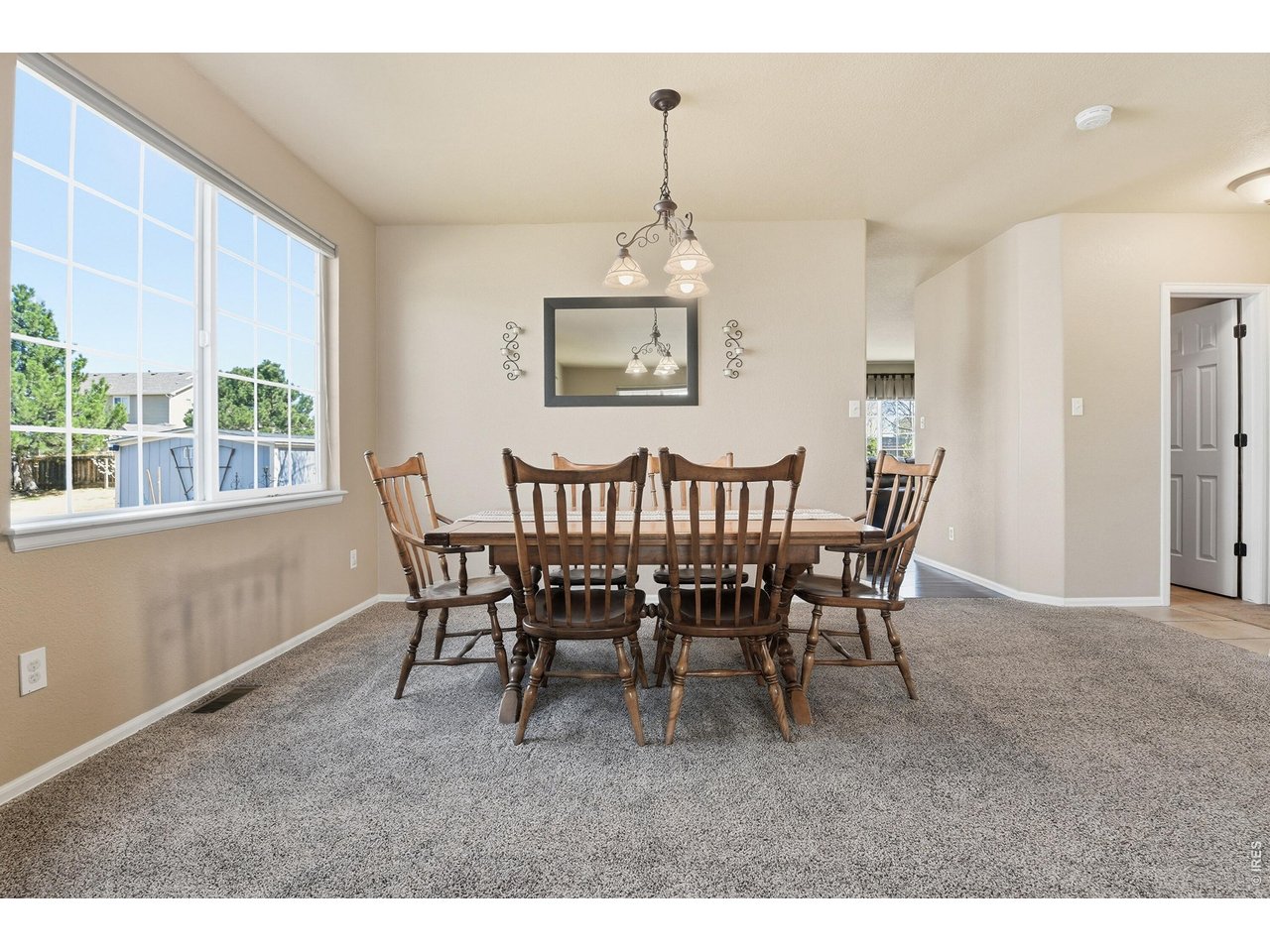 6291 Taylor Street Frederick, CO 80530 - Photo 7 of 50 a view of a dining room with furniture window and outside view