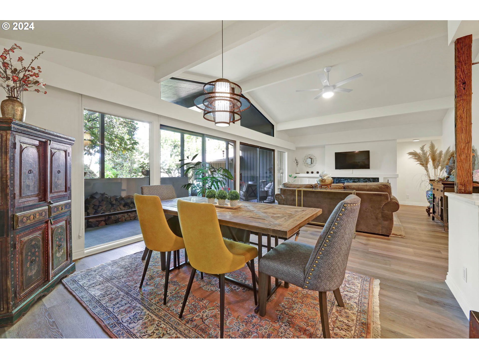 1625 Braeman Village Eugene, OR 97405 - Photo 12 of 41 a view of a dining room with furniture a chandelier and wooden floor