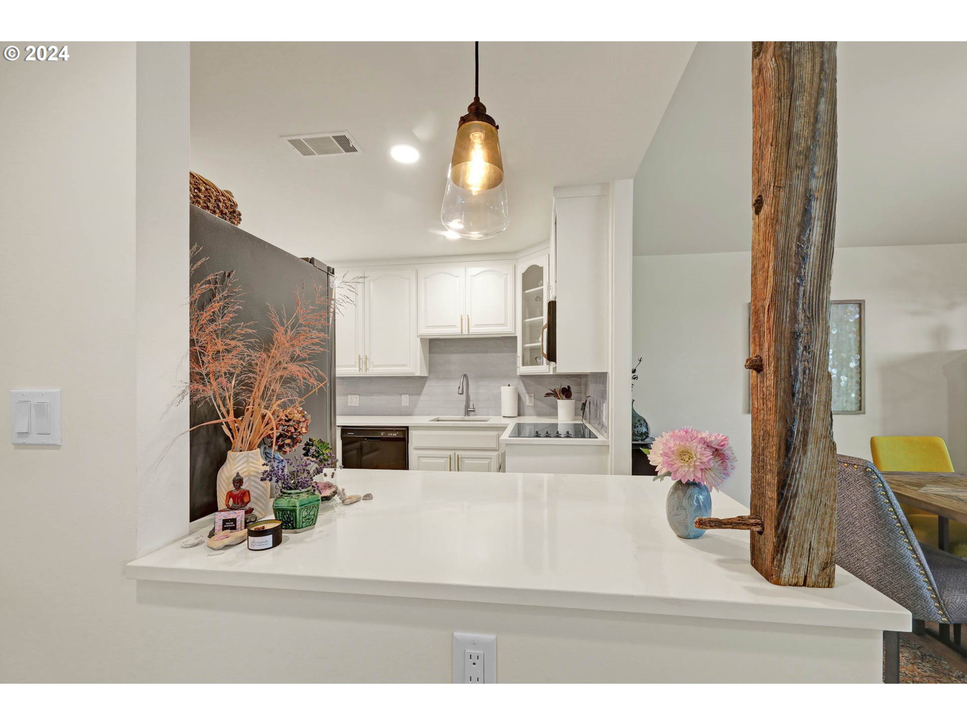 1625 Braeman Village Eugene, OR 97405 - Photo 14 of 41 a living room with kitchen island furniture and a chandelier