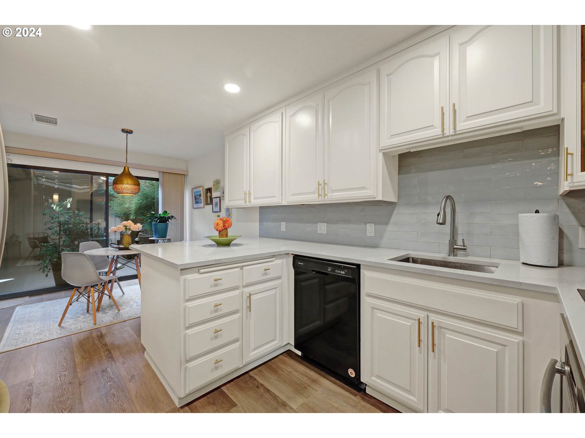 1625 Braeman Village Eugene, OR 97405 - Photo 16 of 41 a kitchen with cabinets appliances and a counter space