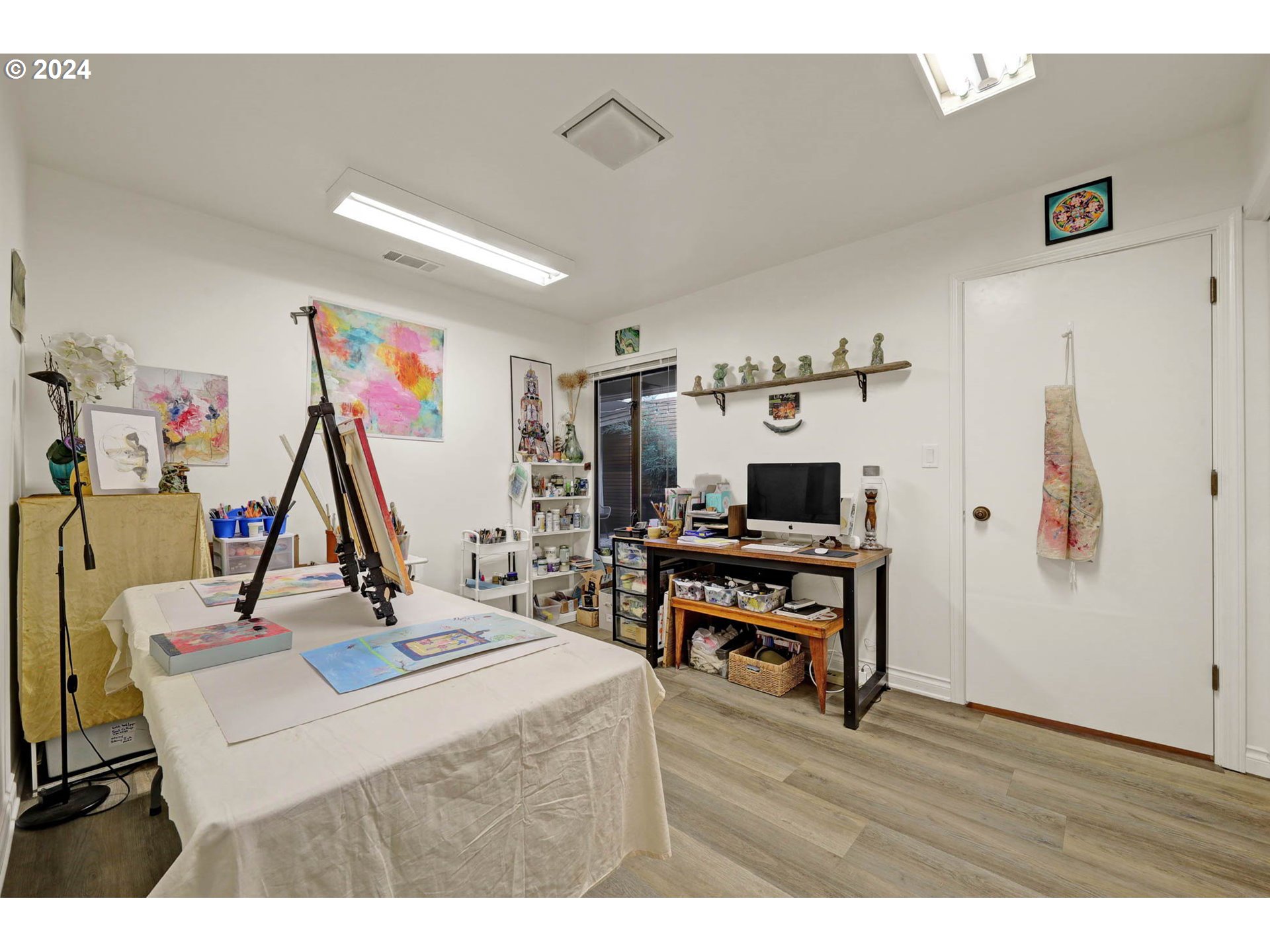 1625 Braeman Village Eugene, OR 97405 - Photo 27 of 41 a living room with furniture and a wooden floor