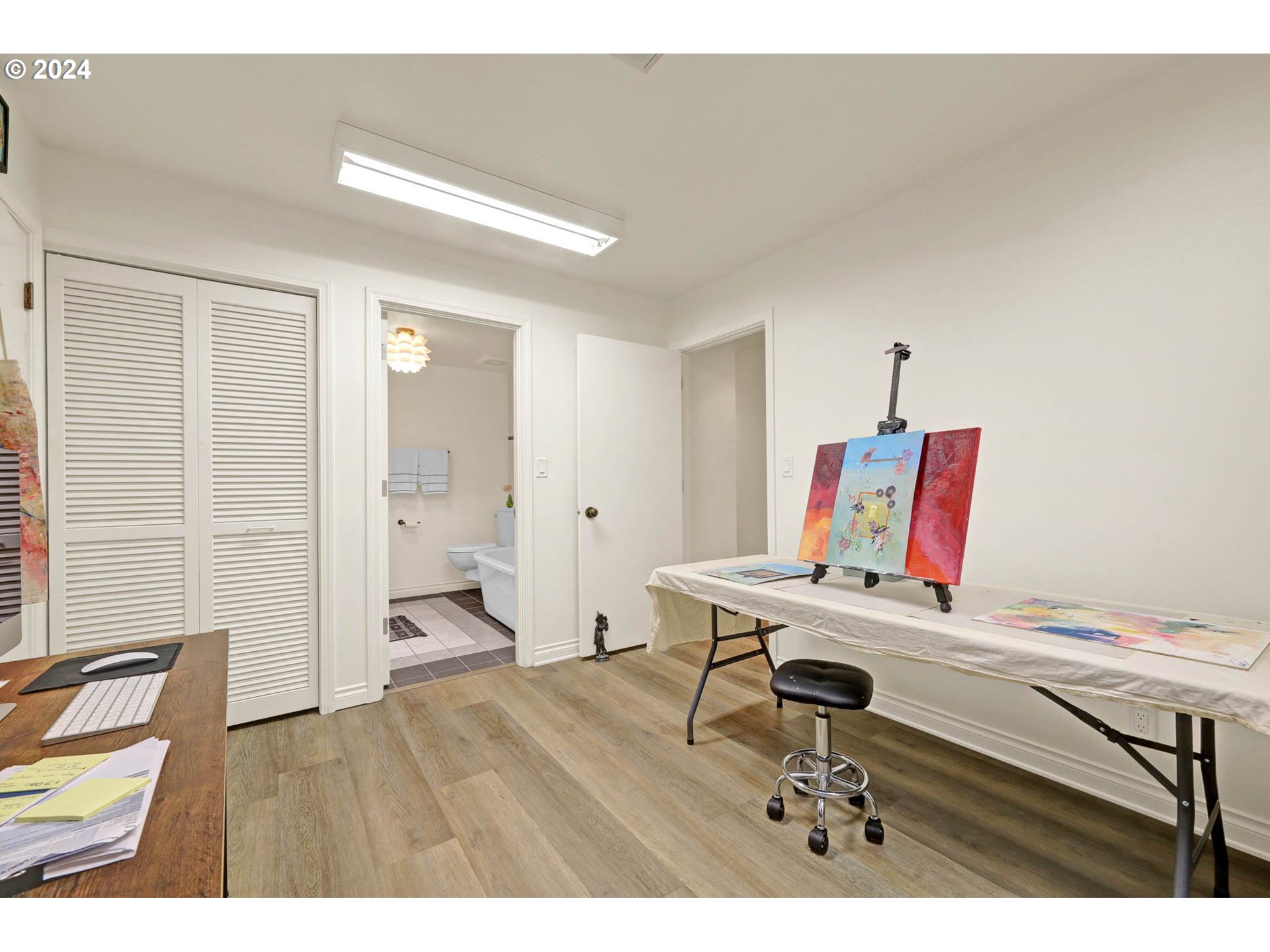 1625 Braeman Village Eugene, OR 97405 - Photo 28 of 41 a workspace with furniture and a wooden floor