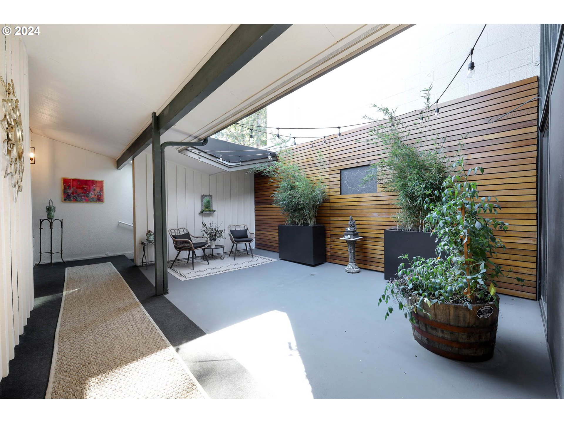 1625 Braeman Village Eugene, OR 97405 - Photo 29 of 41 a living room with furniture and a potted plant