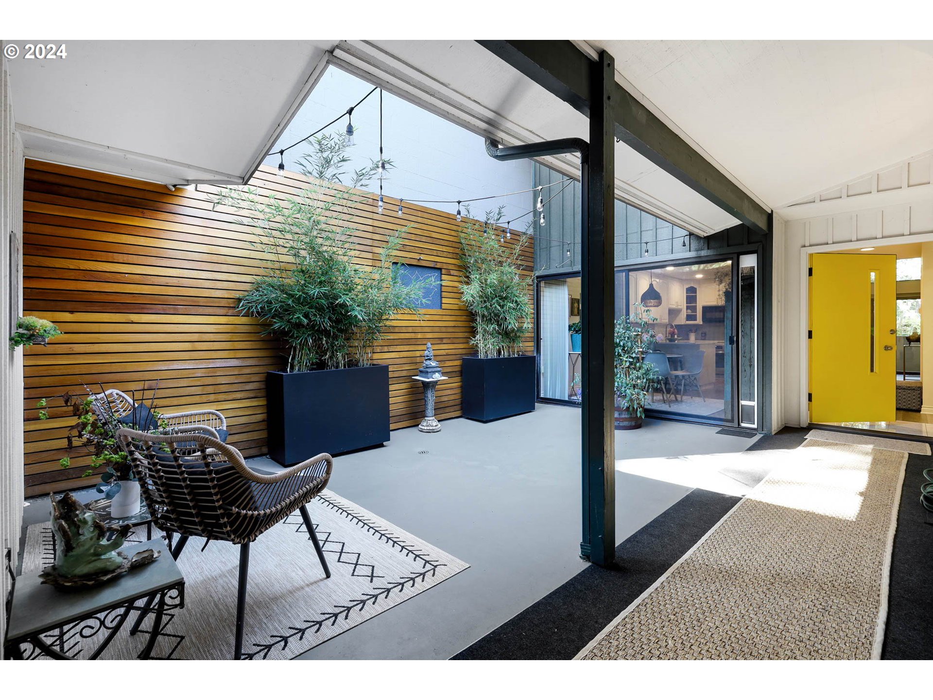 1625 Braeman Village Eugene, OR 97405 - Photo 31 of 41 a view of a patio with table and chairs and potted plants