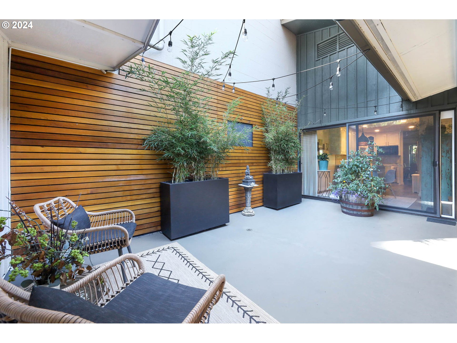 1625 Braeman Village Eugene, OR 97405 - Photo 32 of 41 a view of a patio with table and chairs potted plants