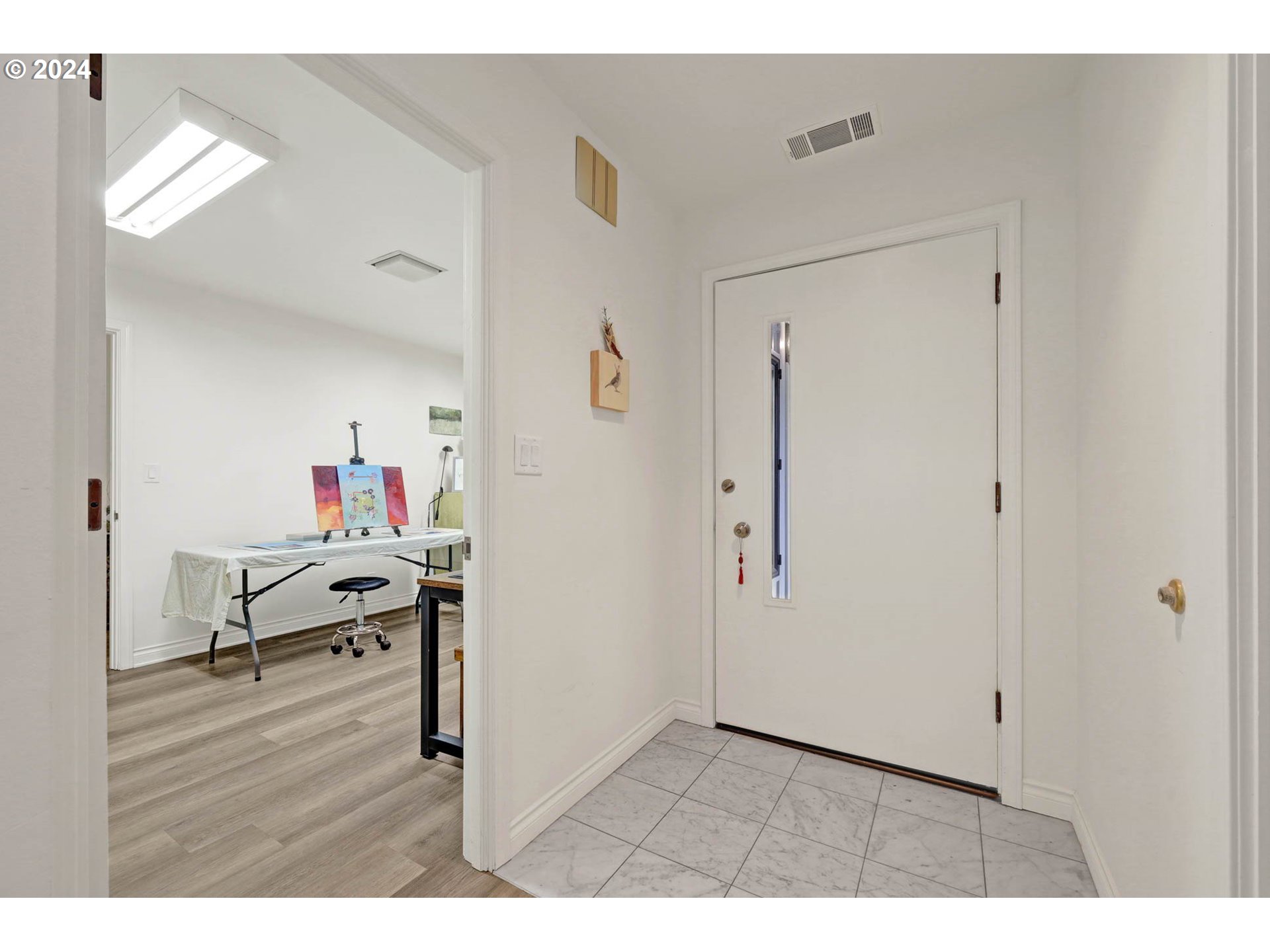 1625 Braeman Village Eugene, OR 97405 - Photo 5 of 41 a living room with furniture and a wooden floor
