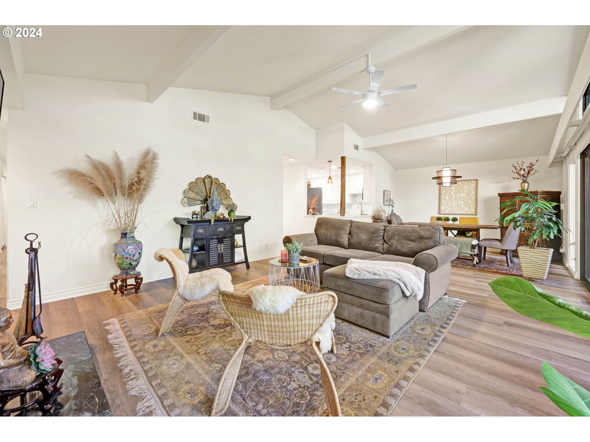 1625 Braeman Village Eugene, OR 97405 - Photo 9 of 41 a living room with furniture and a chandelier