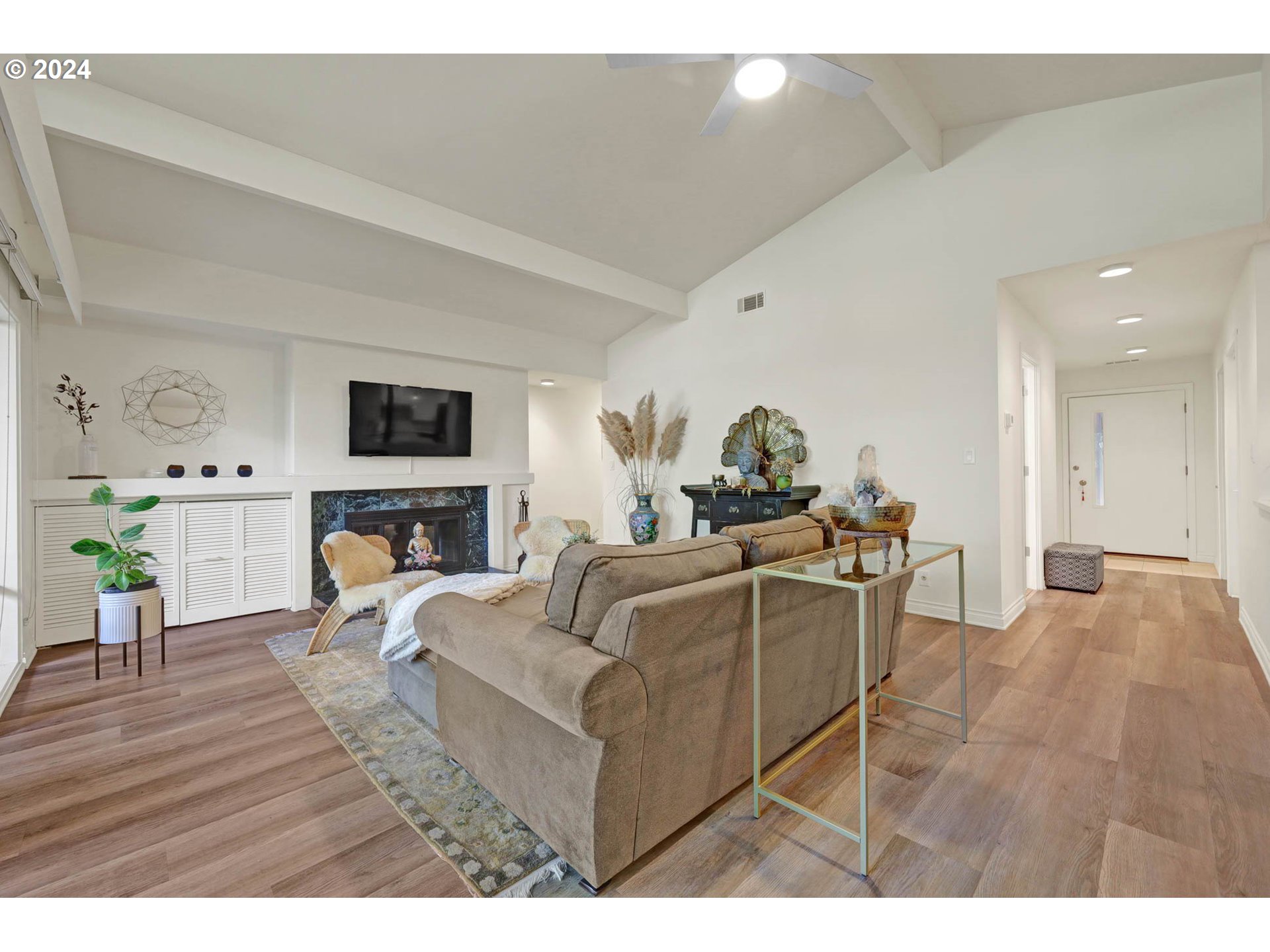 1625 Braeman Village Eugene, OR 97405 - Photo 10 of 41 a living room with furniture a dining table and a potted plant