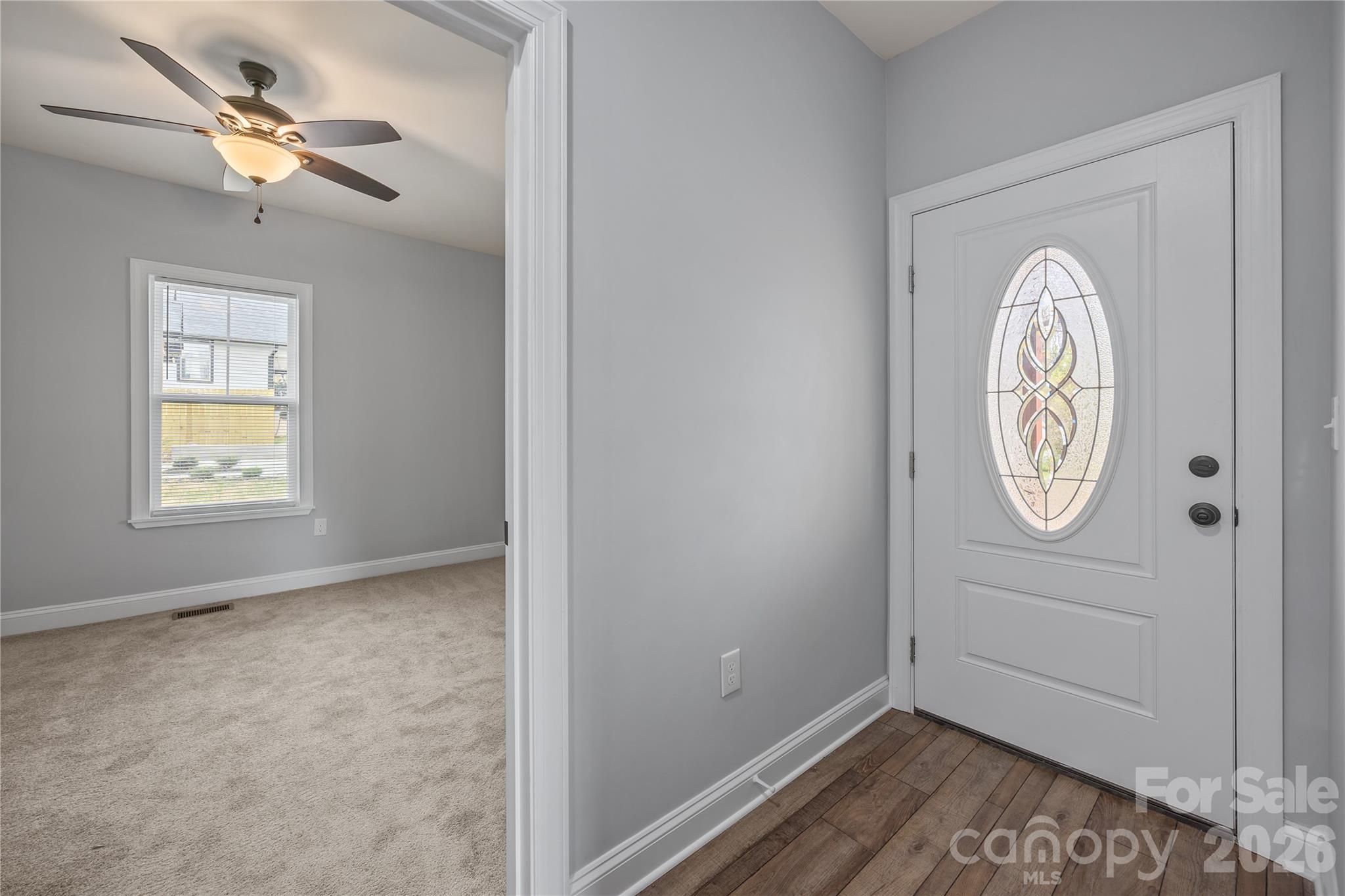 94 James Street Southwest Concord, NC 28025 - Photo 19 of 40 a view of entryway with wooden floor