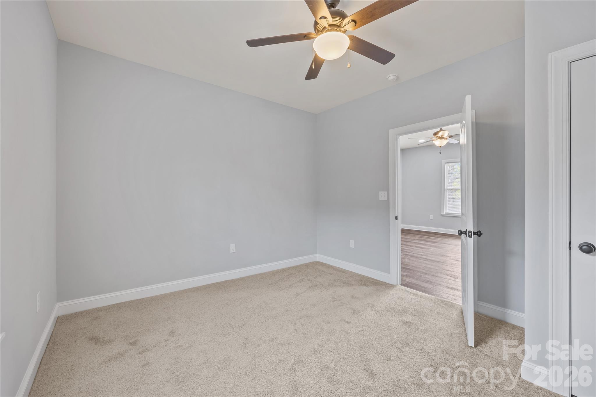 94 James Street Southwest Concord, NC 28025 - Photo 27 of 40 wooden floor in an empty room
