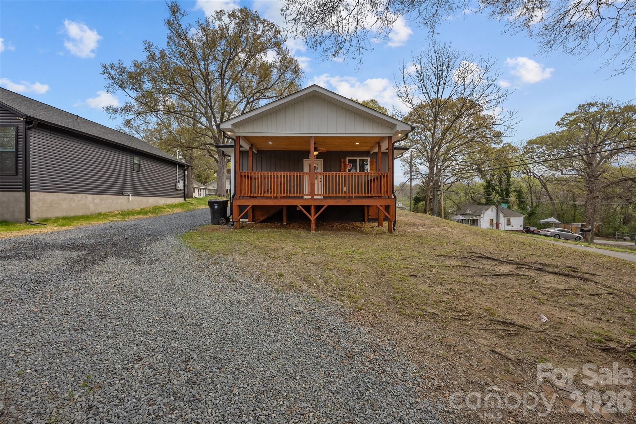 94 James Street Southwest Concord, NC 28025 - Photo 29 of 40 a view of a house with pool and sitting area