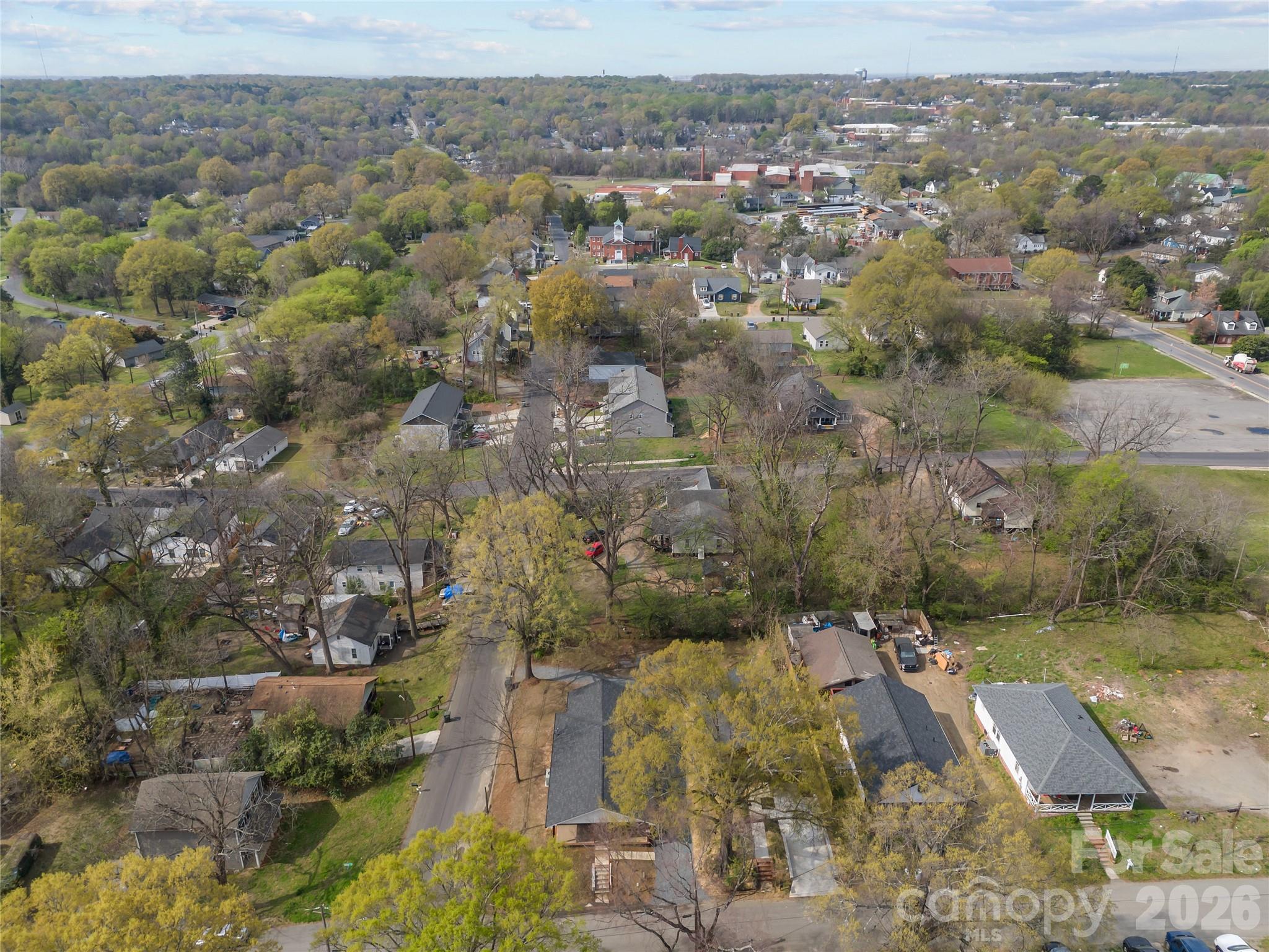 94 James Street Southwest Concord, NC 28025 - Photo 38 of 40 an aerial view of residential houses with outdoor space
